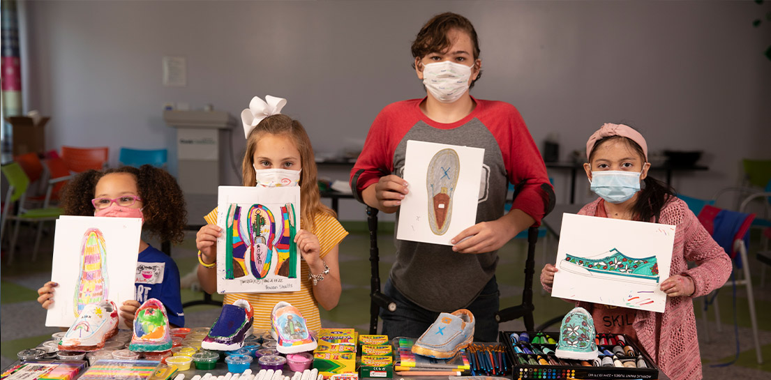 Artists displaying shoe art