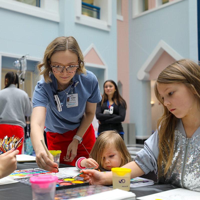 Girl painting mermaid