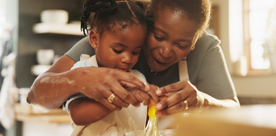 mother and daughter cooking together