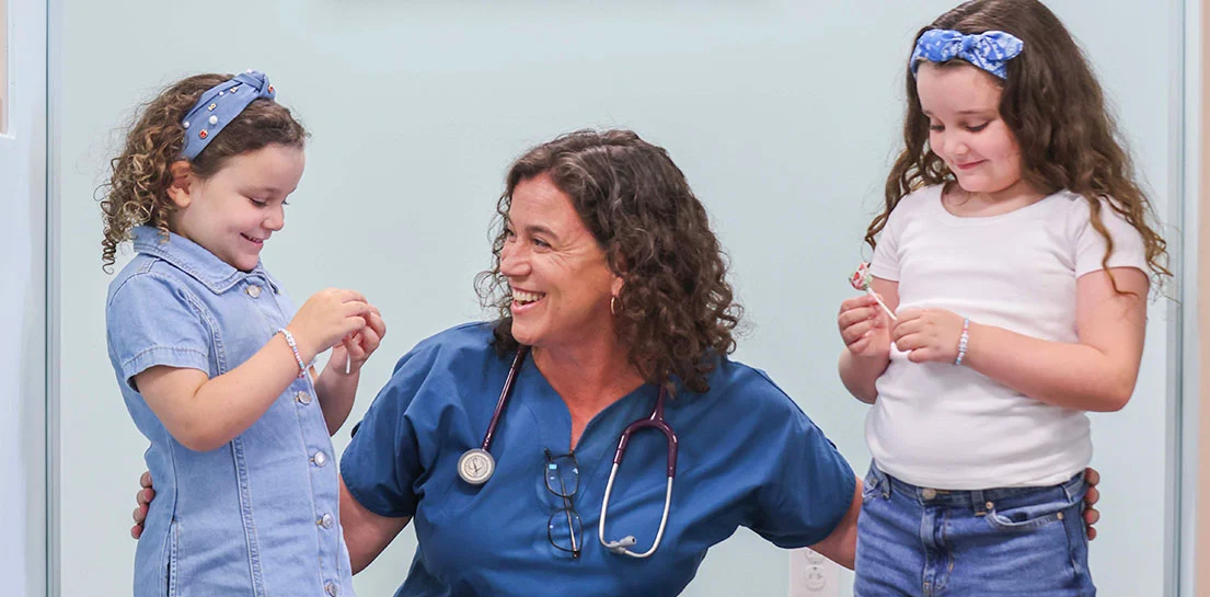 Doctor with two girls