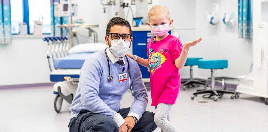 Endowed Chair Anish Ray, M.D., with a patient
