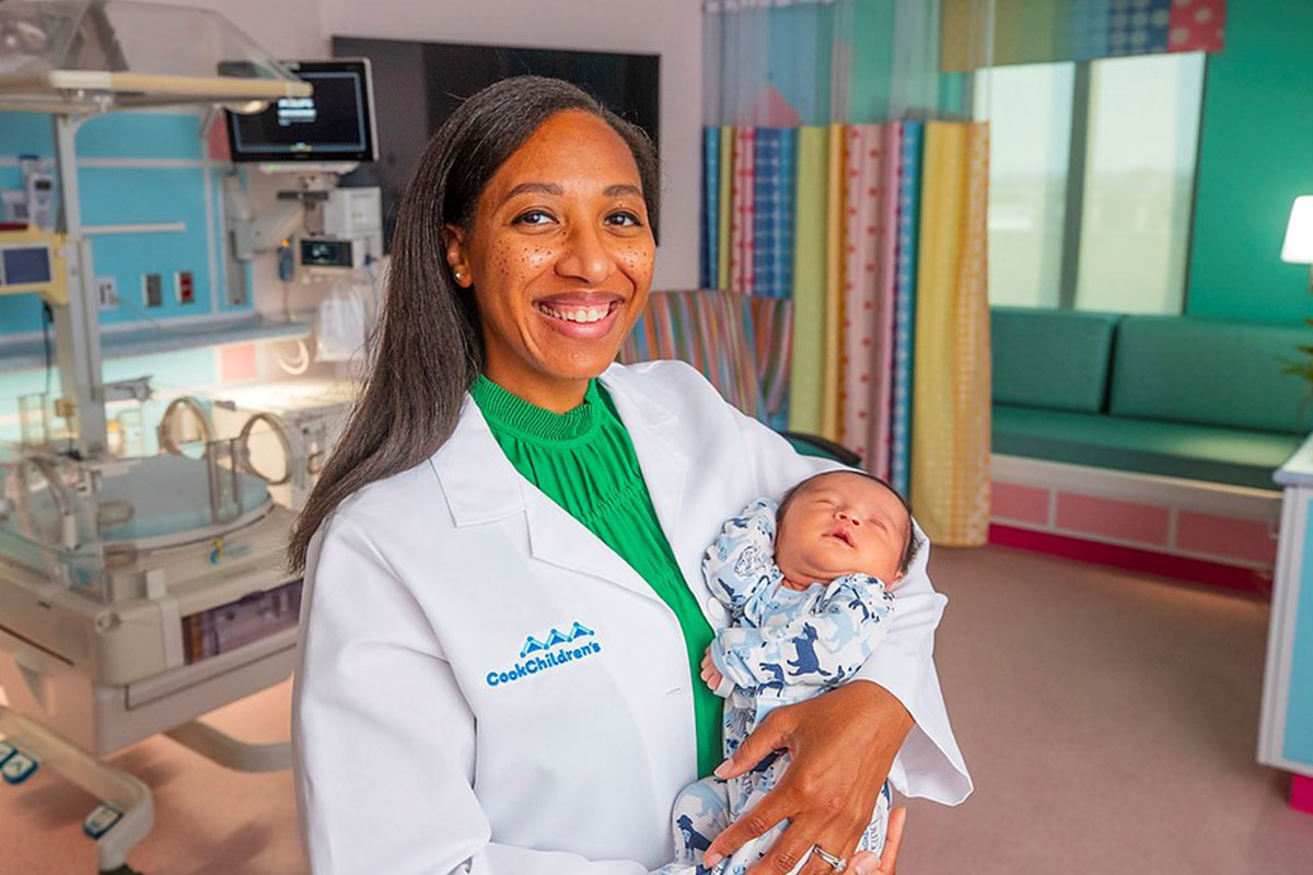 Doctor and newborn in Prosper NICU