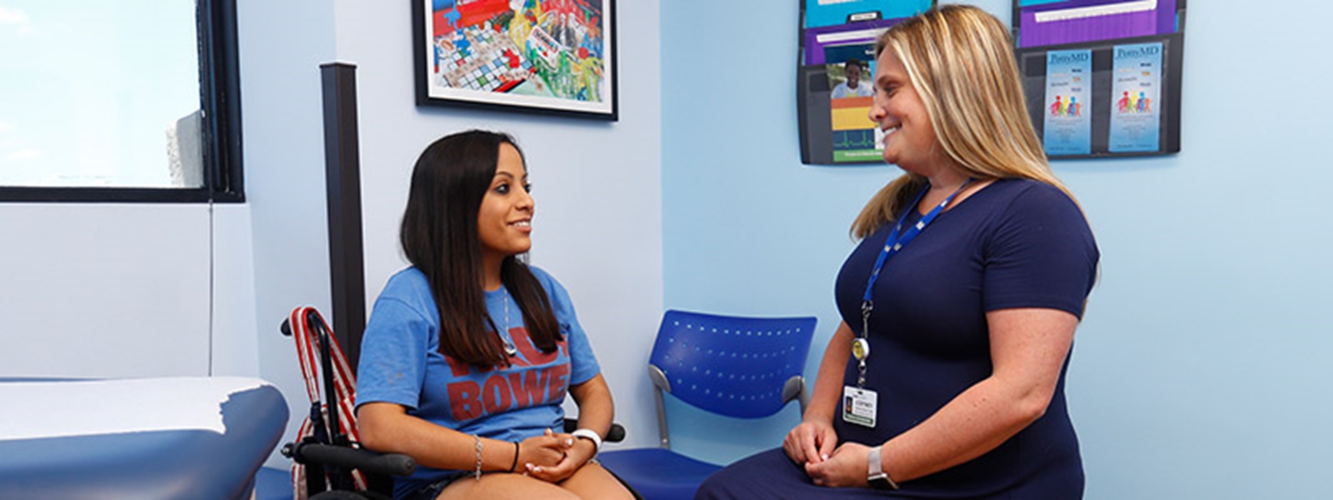spina bifida specialist talks with patient