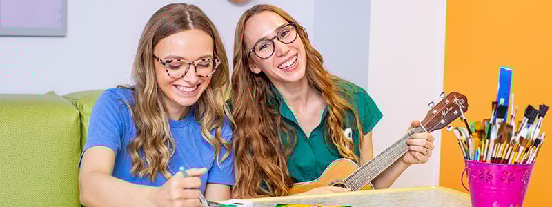 Doing art listening to guitar