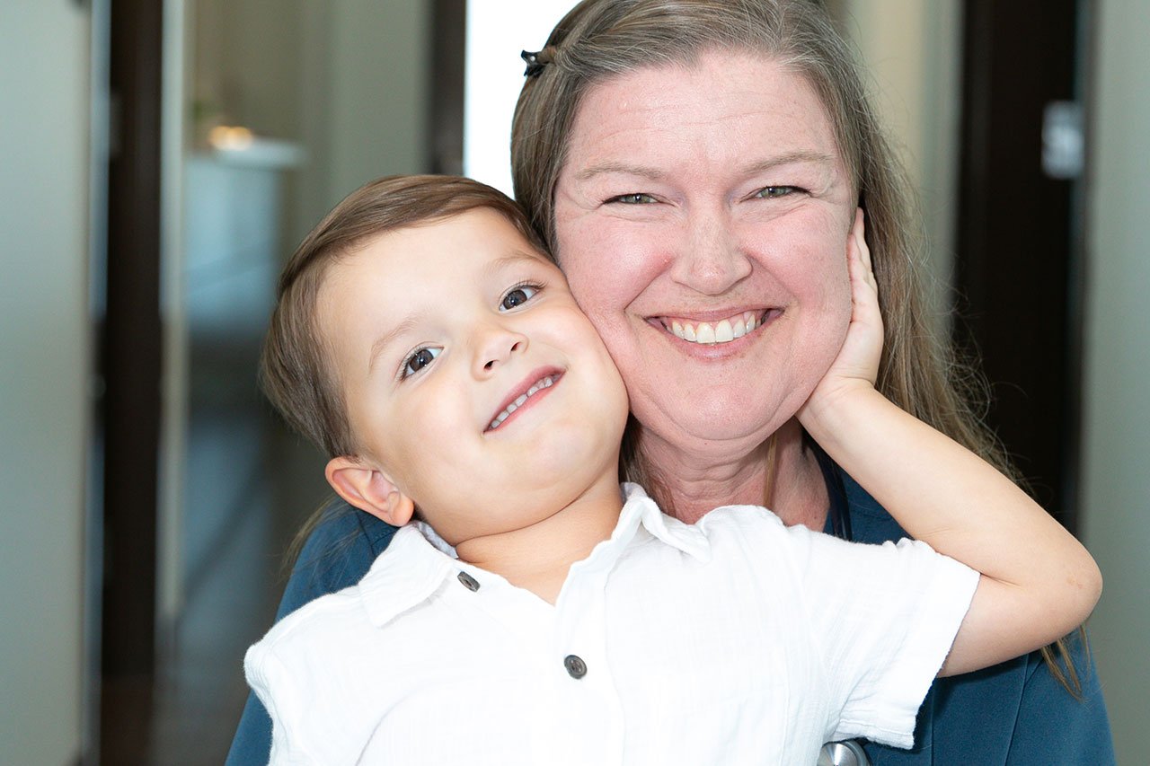 Dr. Piehl with boy.